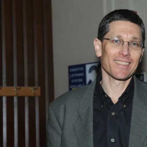 ene Robinson of the University of Illinois, shown here following his Jan. 6 talk at UC Davis, is heavily involved in "The Manhattan Project of Entomology." (Photo by Kathy Keatley Garvey)