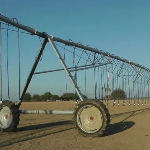 A new center pivot irrigation system at the UC West Side Research and Extension Center was introduced to participants in the twilight field day and farm tour in September.