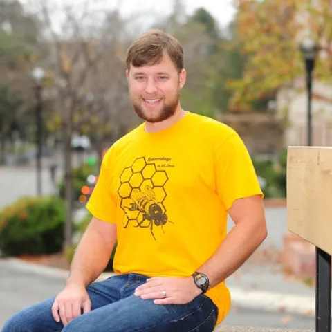 Graduate student Danny Klittich with his prize-winning design. (Photo by Kathy Keatley Garvey)