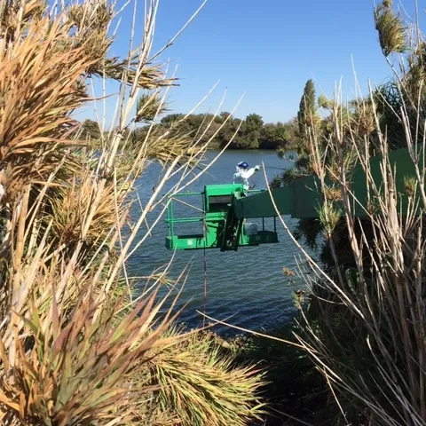 Figure 2. Chemical application by aerial lift.