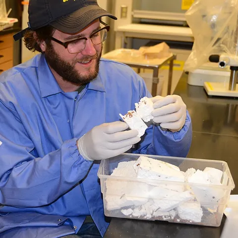 UC Davis doctoral student Trevor Fowles, shown here with his mealworms, won a $15,000 EPA grant for his project, "Beetle Larvae as Biodegraders of Styrofoam and Organic Waste." (Photos by Kathy Keatley Garvey)