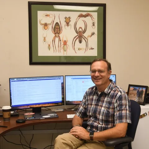 Professor Jason Bond, newly selected Evert and Marion Schlinger Endowed Chair in Insect Systematics, the UC Davis Department of Entomology and Nematology, in his office in Academic Surge. (Photo by Kathy Keatley Garvey)