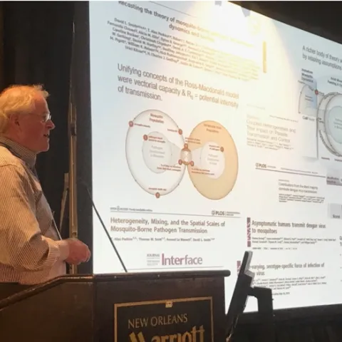 UC Davis medical entomologist Thomas Scott, recipient of the Harry Hoogstraal Medal for Outstanding Achievement in Medical Entomology, delivering a seminar to the American Society of Tropical Medicine and Hygiene (ASTMH). (Photo courtesy of ASTMH)