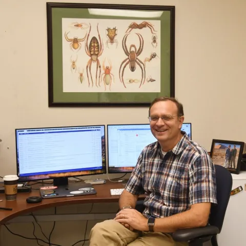 UC Davis professor Jason Bond in his office in the Academic Surge Building. (Photo by Kathy Keatley Garvey)