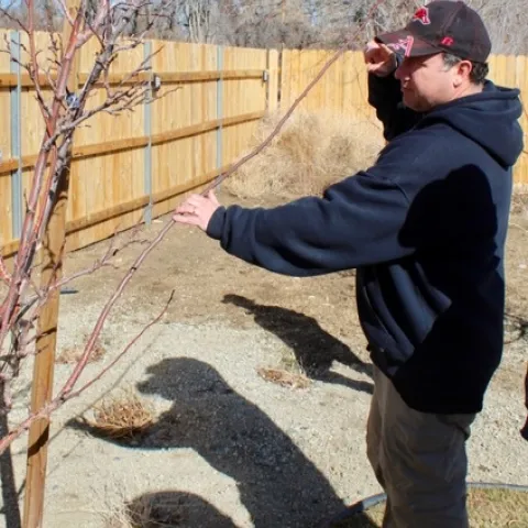 Dustin holding branch out for guiding to 45 degree angle