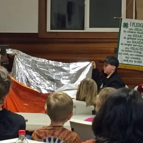 Justin Lehnert, left, is a volunteer with the UC Cooperative Extension 4-H Program.