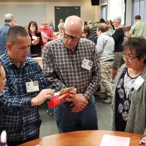 UCCE Master Gardeners learning how to read a pesticide label. (Marcy Sousa, UCCE San Joaquin County)