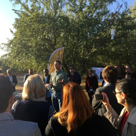 Entomology Advisor David Haviland discusses mating disruption at an educational tour stop sponsored by the University of California
