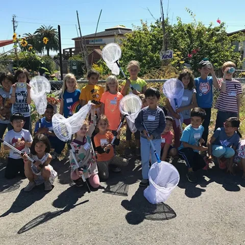Future entomologists? A group of students in a Bay Area three-week insect class, taught by SaveNature.Org, poses for a photo.