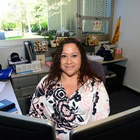 Academic advisor Elvira Galvan Hack in her office in Hutchinson Hall. (Photo by Kathy Keatley Garvey)