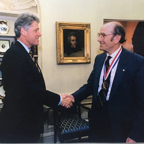 Thomas "Tom" Eisner, the father of chemical ecology, accepts his National Medal of Science award in 1994 from President Bill Clinton for his "seminal contributions in the fields of insect behavior and chemical ecology, and for his international efforts on biodiversity." (Courtesy Photo)