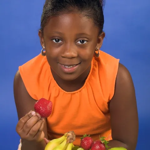 Girl with fruit basket