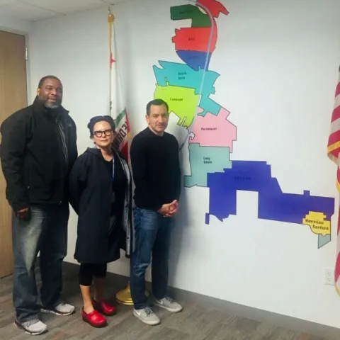 From left, Keith Nathaniel and Dohee Kim briefed Assembly Speaker Anthony Rendon on how LA County residents benefit from UCCE programs.