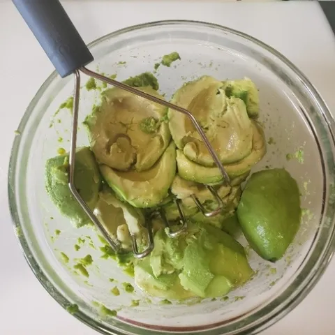 Mashed avocado in a bowl