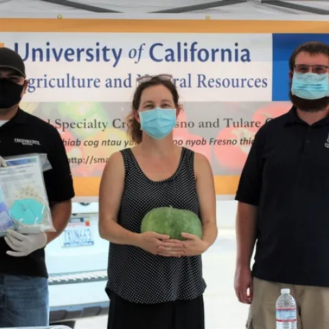 From left, UCCE small-farm team members Jesus Ontiveros Barajas, Marianna Castiaux and Jacob Roberson distributed COVID-19 safety kits to small-scale farmers in Fresno County. Photo by Carmen Mendoza