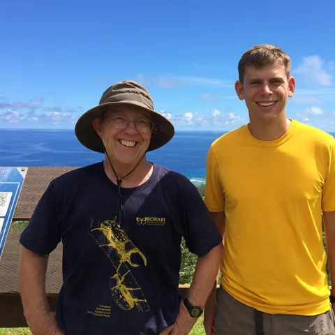 UC Davis emeritus professor Hugh Dingle, wearing a Bohart Museum t-shirt, and then doctoral student Micah Freedman, did monarch research on Guam.