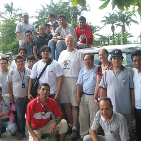 UC Davis medical entomologist Thomas Scott (center) and his field site director Amy Morrison with their mosquito collector and data management teams in Iquitos, Peru. (Photo courtesy of Thomas Scott lab)