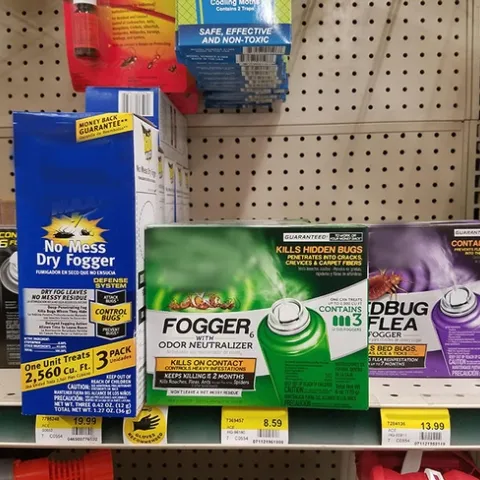 Boxes of total release foggers on a store shelf.