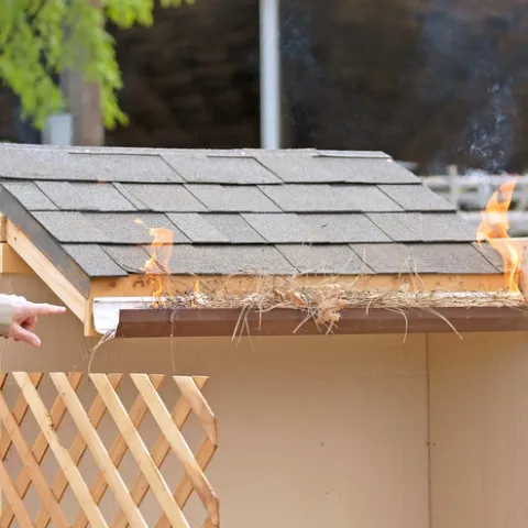 Clearing leaves and pine needles from gutters reduces materials that embers can ignite.