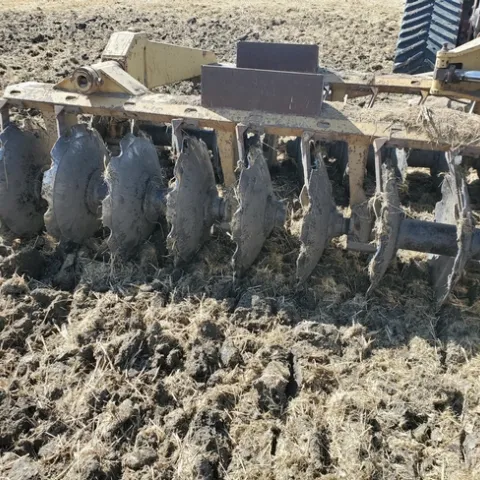 Discing in rice straw (small)
