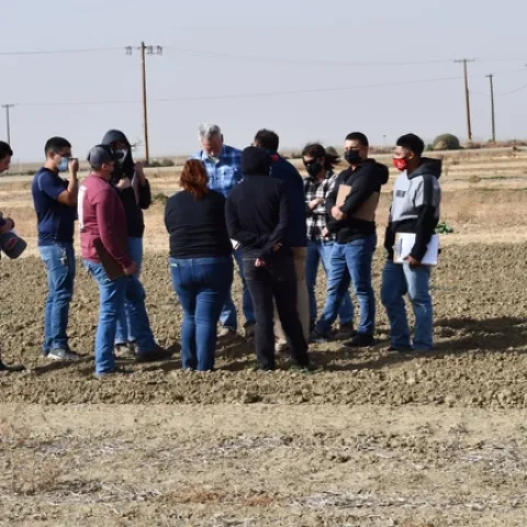 Photo 1.	Fresno State University agronomy students tour the 22-year conservation agriculture systems comparison field at the UC West Side Research and Extension Center in Five Points, CA on October 11, 2021. The group was hosted by Dan Munk, Joy Hollingsworth, and Jeff Mitchell.