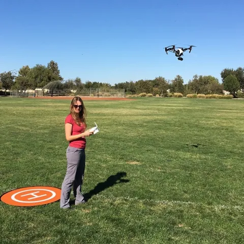Entomologist Elvira Lange utilizing a drone. Agricultural drones, she said, are "highly versatile and have great commercial potential."
