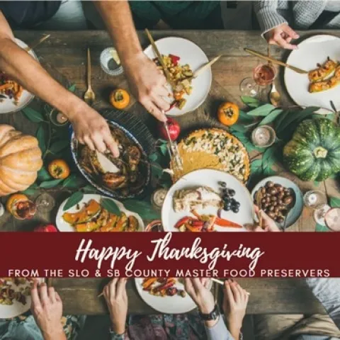 Looking down at a table set with food. Hands are reaching in with utensils to put turkey and sweet potatoes on plates. Banner reads Happy Thanksgiving from the SLO and SB County Master Food Preservers