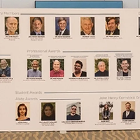 The Hall of Fame at the ESA meeting included images of Frank Zalom, Honorary Member, and Kelli Hoover, Fellow. (Entomological Society of America/Photography G)