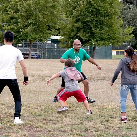 4-H summer camp participants exercise.