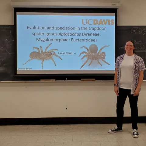 UC Davis doctoral candidate Lacie Newton delivering her exit seminar.