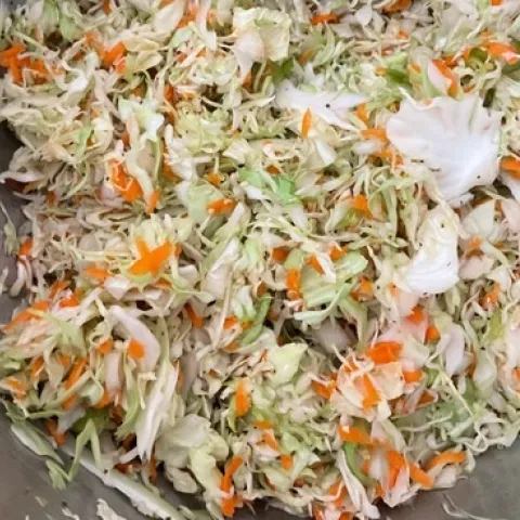 Coleslaw mixed with syrup.