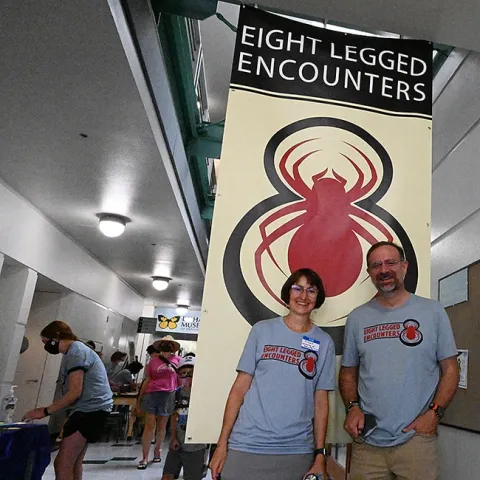 Associate Dean Jason Bond of UC Davis and Professor Eileen Hebets of the University of Nebraska, Lincoln, at the "Eight Legged Encounters" open house, hosted by the Bohart Museum of Entomology and the American Arachnological Society. (Photo by Kathy Keatley Garvey)