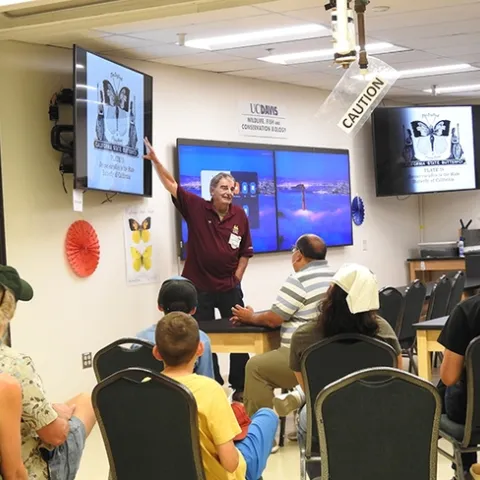 Bohart associate Greg Kareofelas talks about the history of the California dogface butterfly. (Photo by Kathy Keatley Garvey)