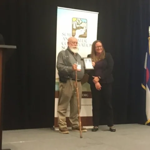 Tom Willey receiving SWCS recognition in Denver CO 2022