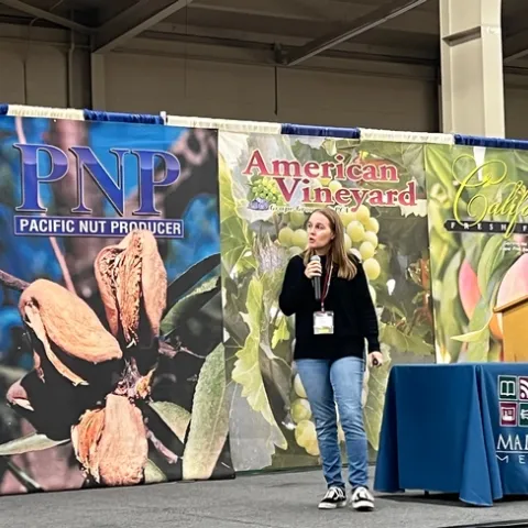 Julie Finzel presents seminar on vertebrate management in orchards at the Tree and Vine Expo in November, 2022.
