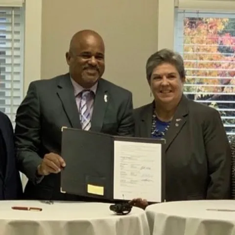 From left, CARCD President Don Butz, USDA NRCS State Conservationist Carlos Suarez, Glenda Humiston and CDFA Secretary Karen Ross sign a memorandum of agreement for the California Conservation Planning Partnership. Photo courtesy of CDFA