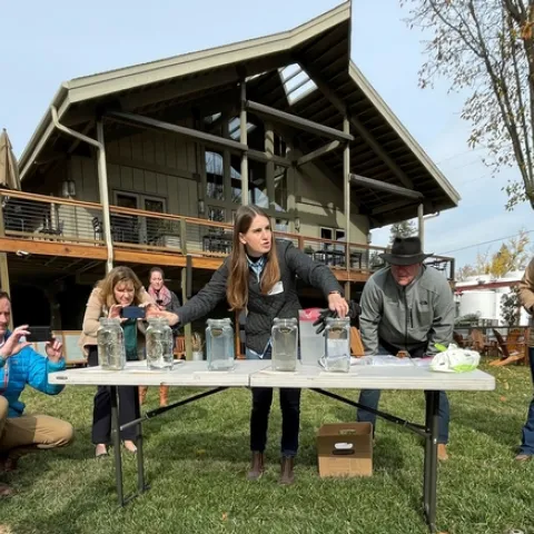 Hope Zabronsky demonstrated how soil aggregates from conventionally tilled fields compared to soil from fields using low-till or no-till farming practices.