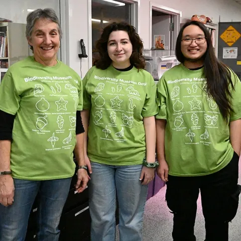 Wearing of the Green--Ready to greet the crowd at the Bohart Museum of Entomology on Feb. 18 are (from left) Lynn Kimsey, director of the Bohart Museum of Entomology and a UC Davis distinguished professor of entomology, and entomology students and Bohart associates, Sol Wantz, president of the Entomology Club, and Allen Chew. (Photo by Kathy Keatley Garvey)