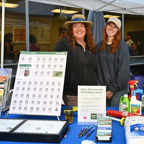 Ready to field questions are these representatives of the UC Statewide Integrated Pest Management Program: Karey Windbiel-Rojas (left), associate director for Urban and Community IPM/Area IPM Advisor, and IPM educator Lauren Fordyce. (Photo by Kathy Keatley Garvey)