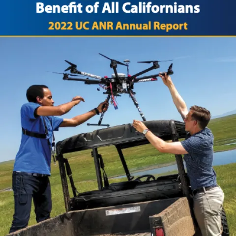 Two guys load a drone into a pickup. Working together for the benefit of all Californians. 2022 UC ANR Annual Report.