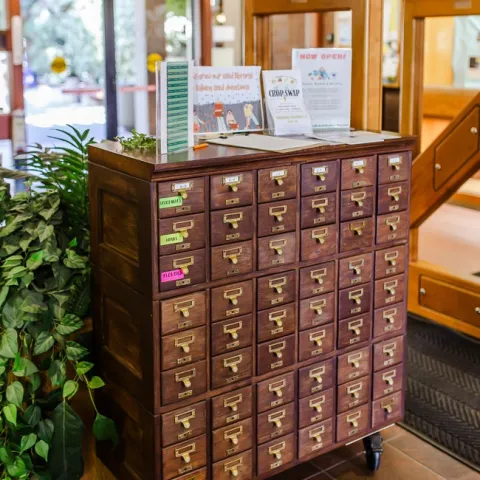 A vintage oak card catalog houses the seed library in the Clovis public library. (All photos: Sarah del Pozo)