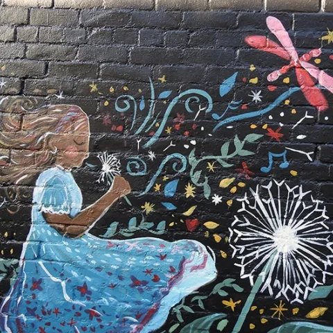 Virginia-based artist Cheyenne Renee Marcus painted this mural at the corner of Main and Elizabeth streets, Vacaville, in 2022. It's a main attraction. (Photo by Kathy Keatley Garvey)