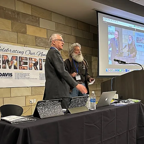 UC Davis distinguished professor Walter Leal (left), organizer and host of the emeriti celebrations, introduces UC Davis distinguished professor emeritus Art Shapiro, known as "the butterfly guru."