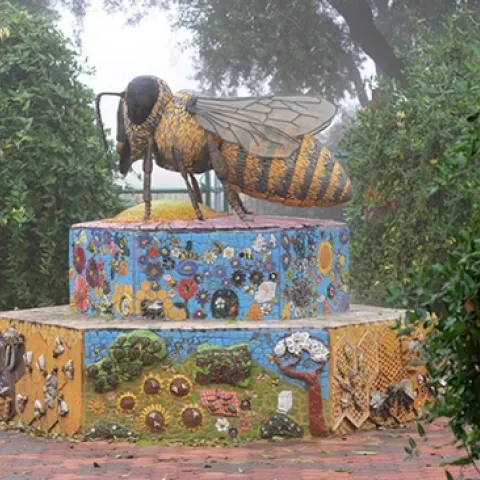 Miss Bee Haven, a ceramic-mosaic sculpture by self-described "rock artist" Donna Billick of Davis, anchors the UC Davis Bee Haven. This image was taken in 2012. (Photo by Kathy Keatley Garvey)