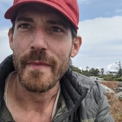 Honey bee scientist Zac Lamas, a National Institute of Food and Agriculture (NIFA) postdoctoral fellow with the USDA's Agricultural Research Services.