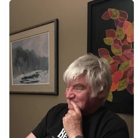 This screen shot of a tweet by UC Davis distinguished professor Walter Leal shows Jeremy Nichol McNeil wearing a UC Davis T-shirt, "The Beetles."