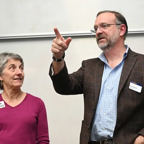 UC Davis distinguished professor emerita Lynn Kimsey, director of the Bohart Museum for 34 years until her retirement on Feb. 1, 2024, listens as the new director, Professor Jason Bond praises her at a retirement party. Bond is the Evert and Marion Schlinger Endowed Chair, UC Davis Department of Entomology and Nematology, and associate dean, UC Davis College of Agricultural and Environmental Sciences. (Photo by Kathy Keatley Garvey)