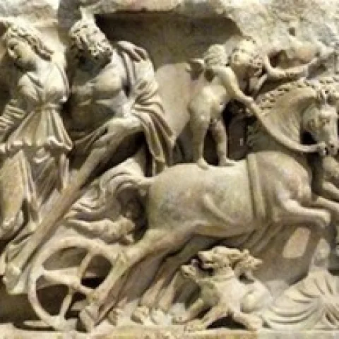 Persephone and other Greek people in statues with a chariot