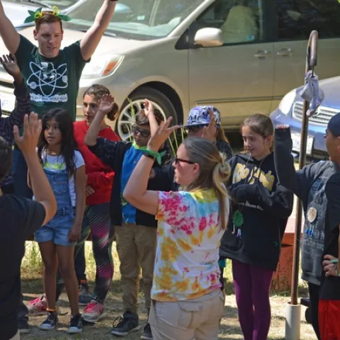 Andrew leading a tree song.