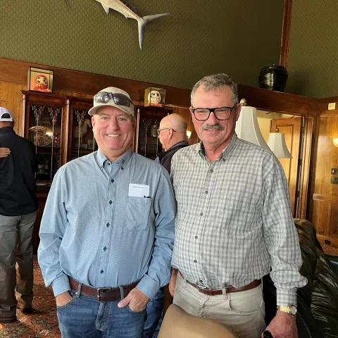 Steve Fennimore, right, stands next to grower Mark Mason